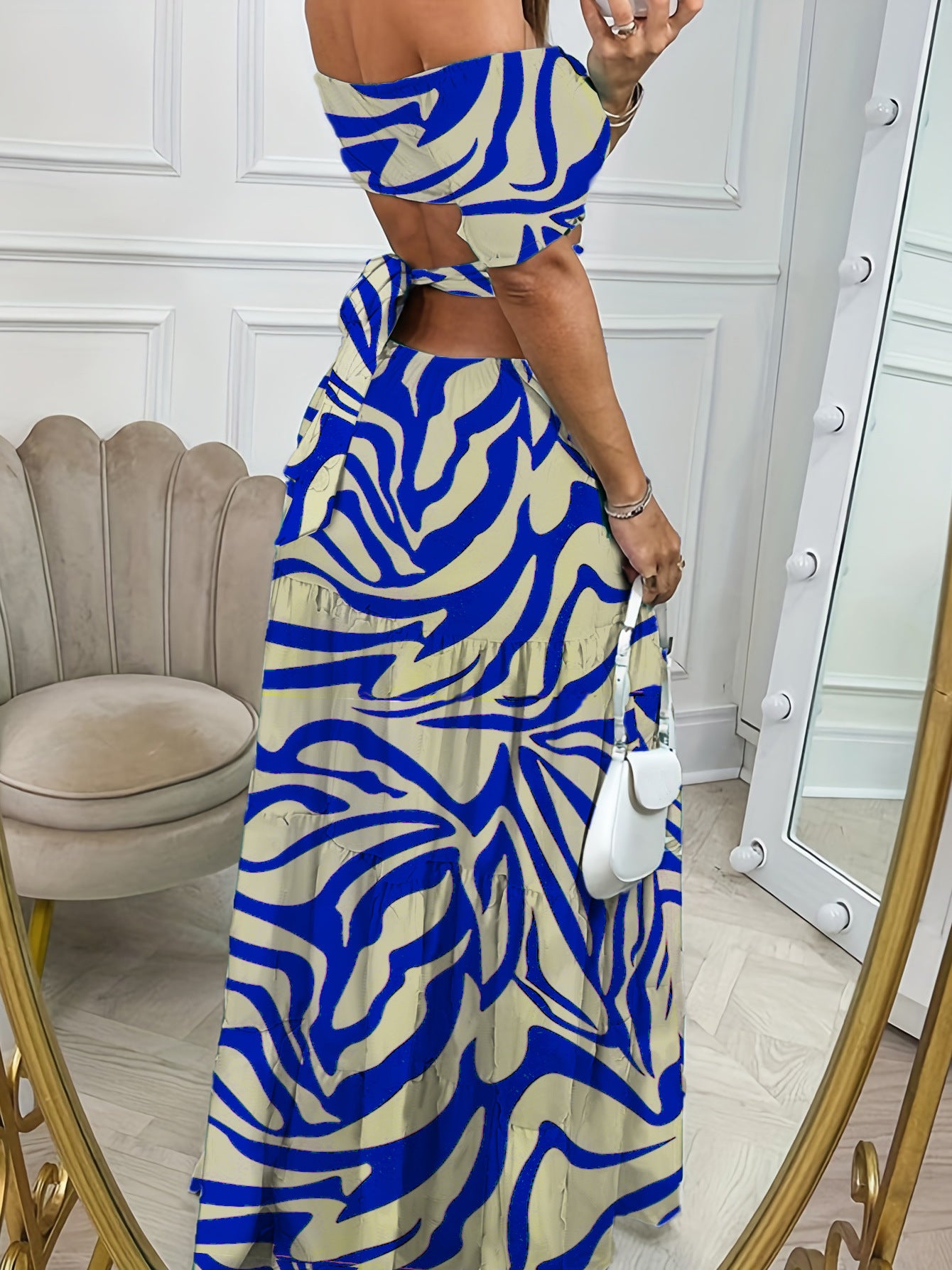 Embrace Summer Elegance with Our Printed One-Line Collar Short-Sleeved Long Dress - Perfect Hollow Waist Design for Distinctive Style